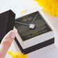 To My Wife | Your Last Everything | Love Knot Necklace on dark background