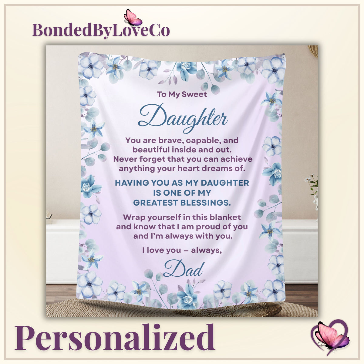 Personalized daughter blanket from Dad in Dusty Rose with a blue floral design, shown hanging in a cozy room setting on thumbnail image
