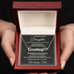 Silver personalized daughter name necklace and message card displayed inside an open mahogany-style luxury gift box.