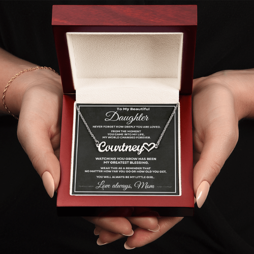 Silver personalized daughter name necklace and message card displayed inside an open mahogany-style luxury gift box.