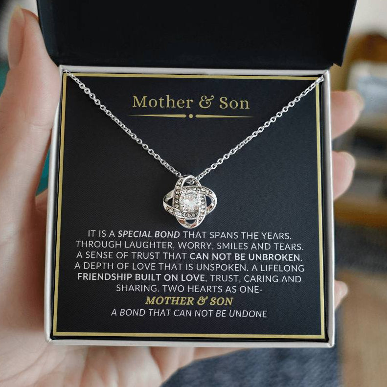 Necklace with a sentimental message card for mother and son