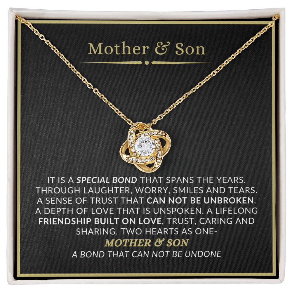 Mother and son love knot necklace gift for mom displayed in gift box with heartfelt message card
