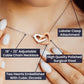 Product detail graphic highlighting the 18 to 22 inch adjustable cable chain, polished surgical steel, cubic zirconia embellished hearts, and lobster clasp attachment.