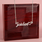Polished silver personalized name necklace displayed with the mahogany-style luxury jewelry box.