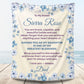 Personalized daughter blanket from Dad in Warm Cream with a blue floral design, shown hanging in a cozy room setting. 